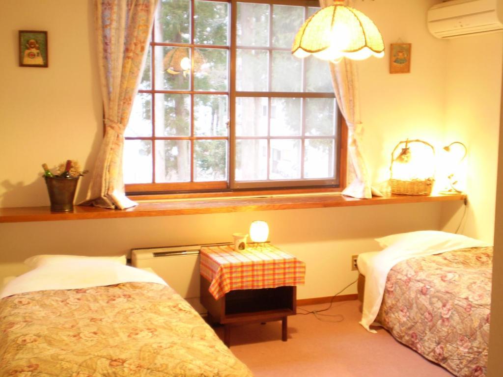 ペンション ちゃうちゃう Acomodação com café da manhã Hakuba Quarto foto