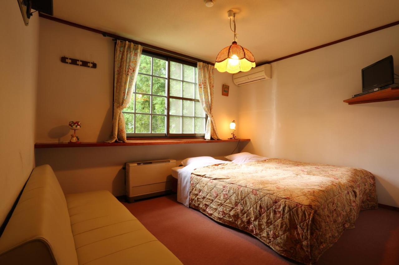 ペンション ちゃうちゃう Acomodação com café da manhã Hakuba Exterior foto